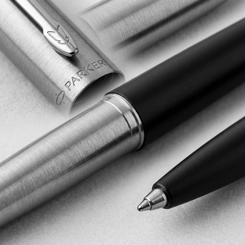 Macro detail of a black Parker Jotter Originals Gel Pen showing the metal tip and engraved cap.
